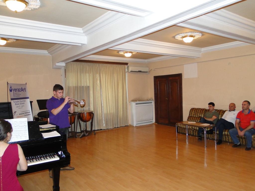 Daniel_Melkonyan_with_Maestro_Eduard_Topchjan_and_teachers.JPG